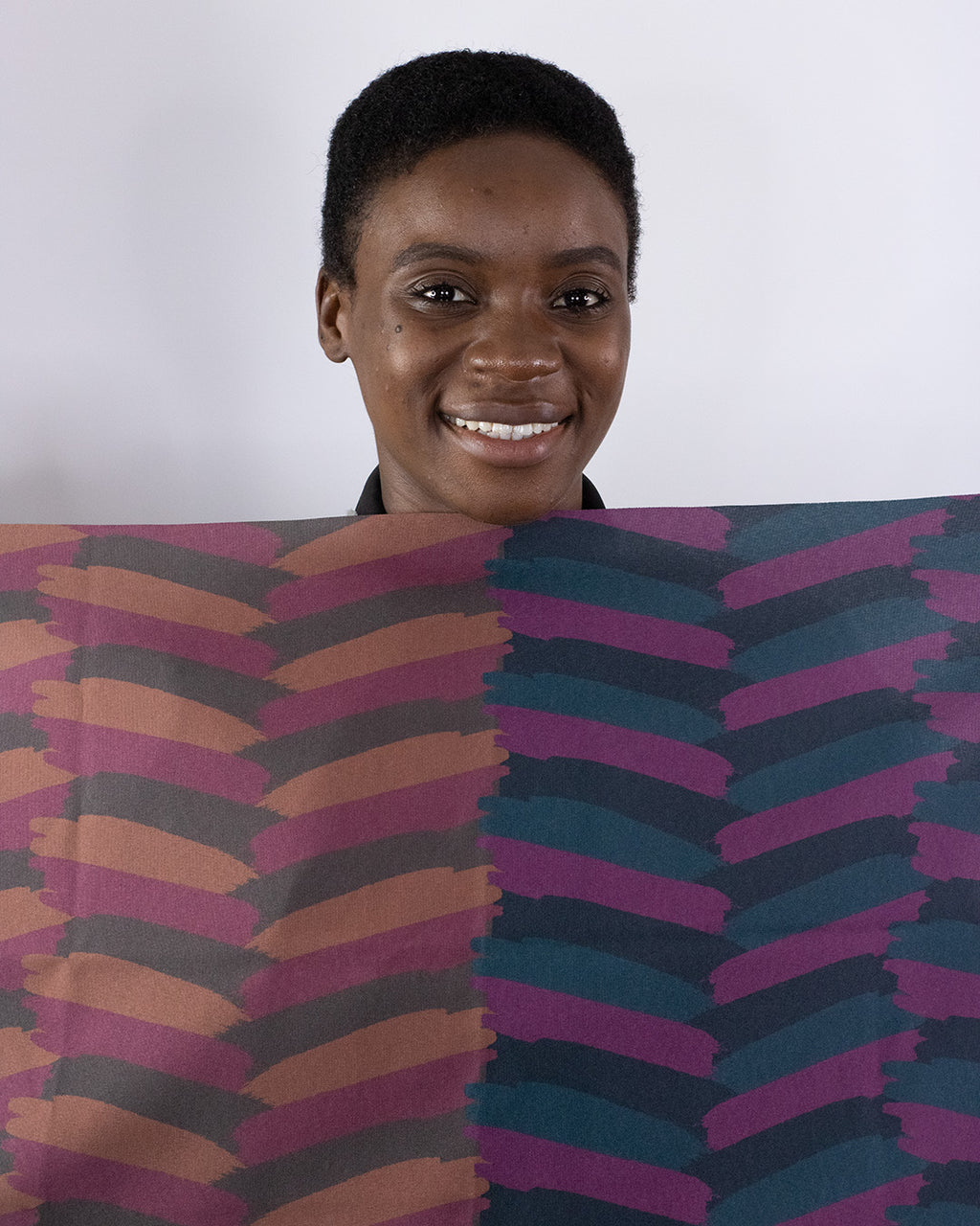 Contrast-patterned fabric drapes used in personal color analysis