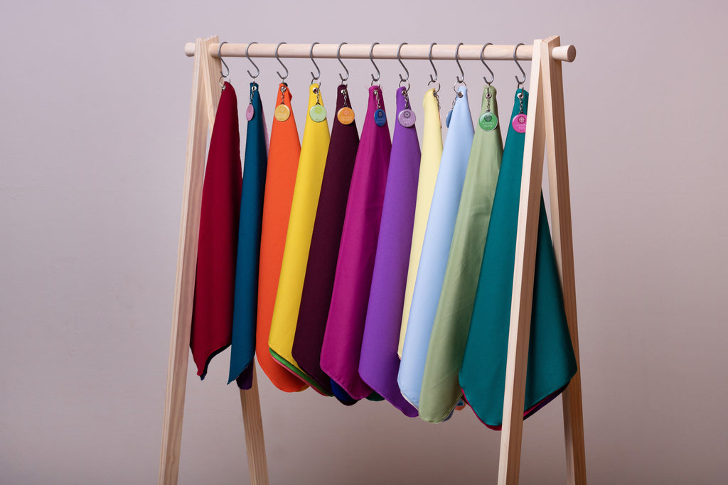 Plain solid colour fabric drapes for seasonal colour analysis